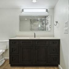 Compact En-Suite Master Bathroom Has All the Amenities that You Could Possibly Want 2