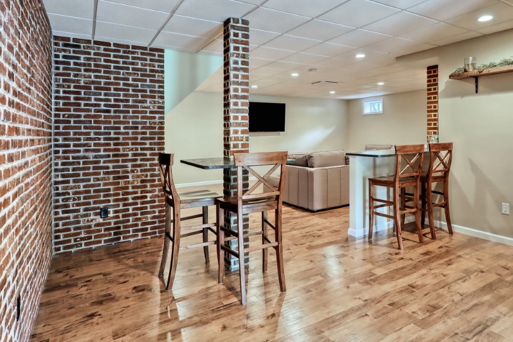 Industrial Decor Themed Clubroom Transformation Complete with Mini Bar, Workout Room and Powder Room