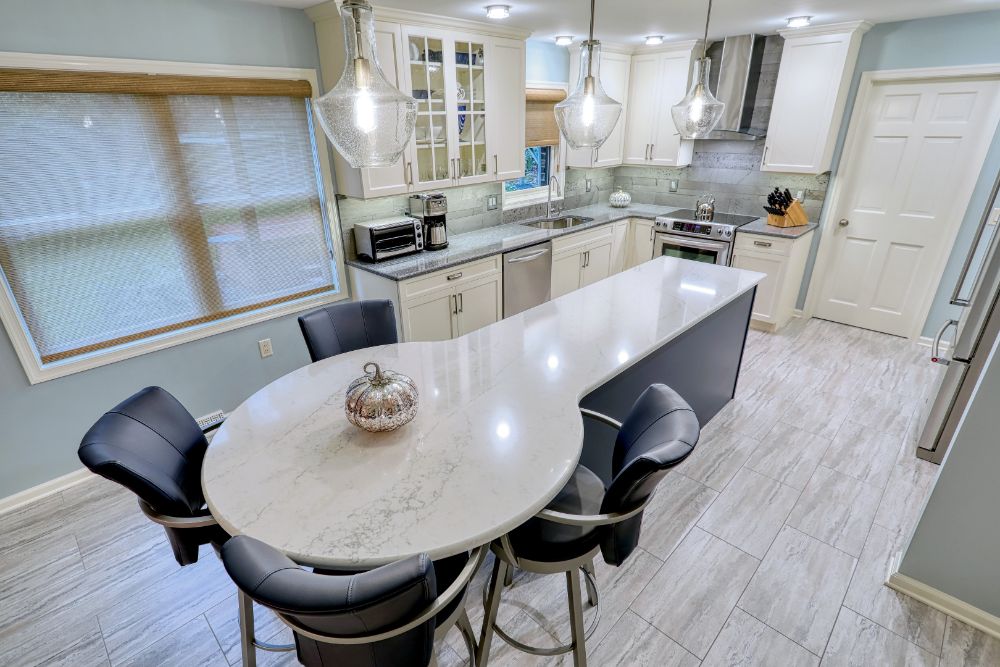 Kitchen gets a new twist with indigo blue and vanilla painted cabinetry in dover pa