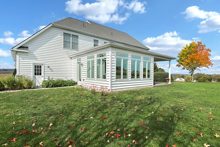 Seamless home addition with matched siding and roof